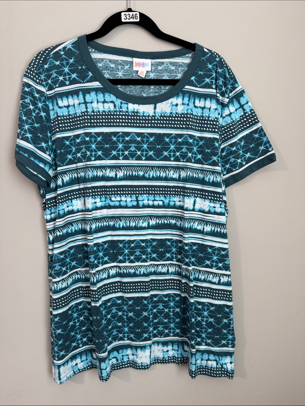 LuLaRoe Short-Sleeve Tee in Teal and White Striped Geometric Print